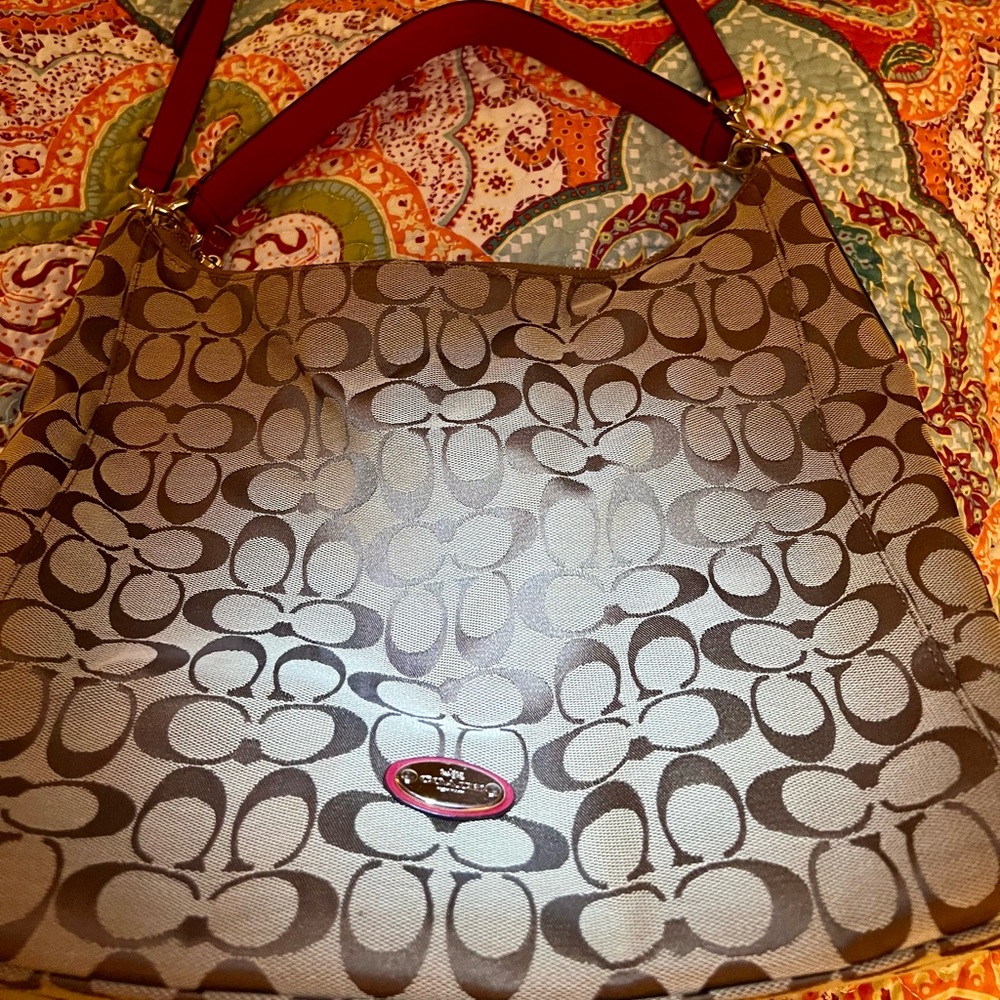 Coach purse. Red & tan with small & long strap.